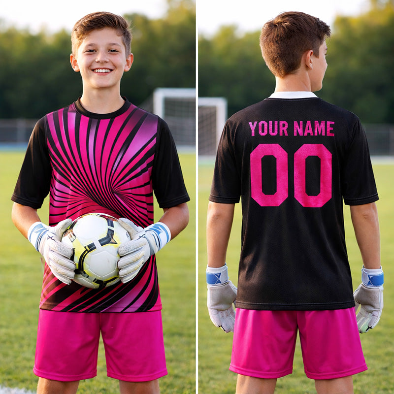 Pink black goalkeeper jersey with pink shorts on a boy